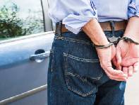 Handcuffed man under arrest