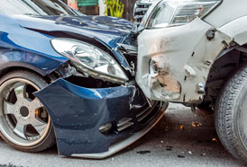 Head on car crash.