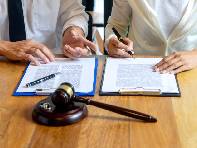 Signing divorce agreement