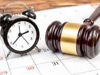 Clock, gavel and calendar